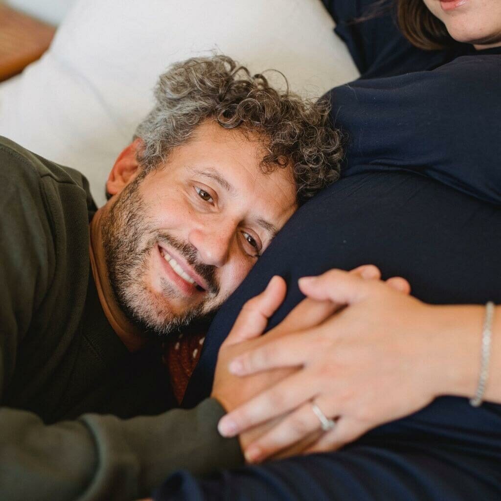 Man loving on pregnant woman