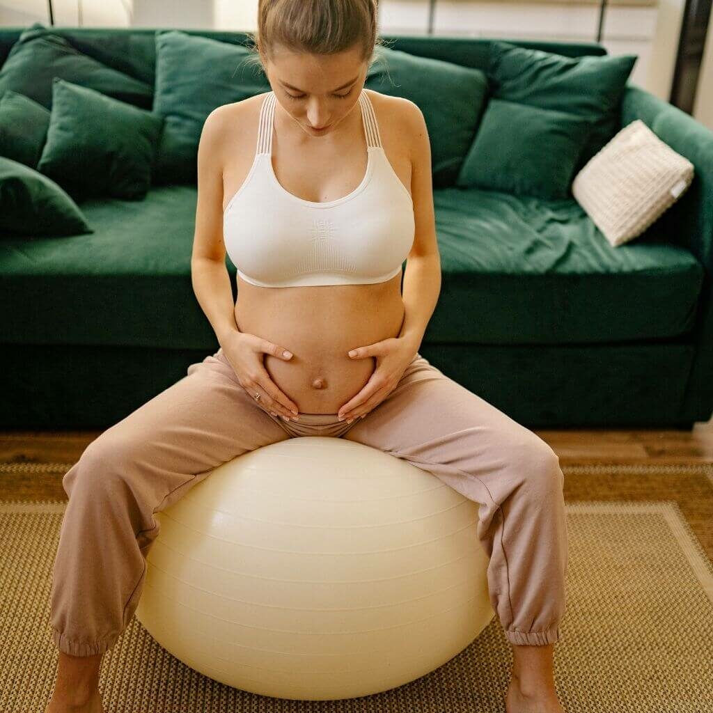 Pregnant woman on exercise ball
