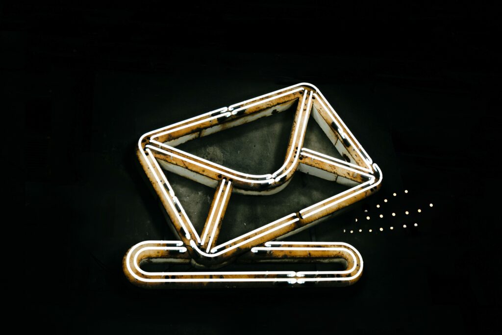 Email image in gold.